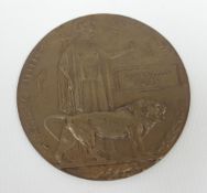 A WWI bronze death plaque to JAMES VICTOR BOWEN and original packet