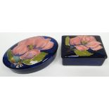 An oval and a rectangular Moorcroft blue-ground tube-lined floral table box