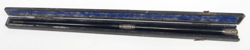 An Edwardian cased ebony conductor's baton with silver mounts and presentation inscription