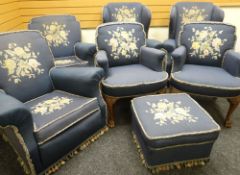 An Edwardian carved and blue wool upholstered, floral tapestry lounge-suite comprising pair of