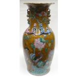 A large circular-based Chinese vase with flared-neck and applied creatures to the upper quarter, the