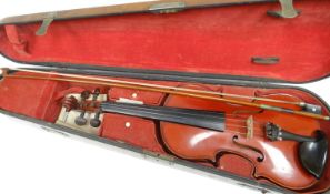 A late nineteenth century / early twentieth century cherry colour French violin by Luthier Buthod,