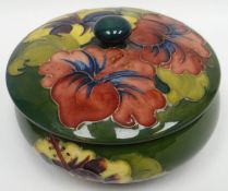 A Moorcroft green ground tube-lined floral powder-bowl and cover, 4.25ins diam (12cms)