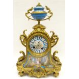 A late nineteenth century gilt-metal and painted Sevres porcelain mantel clock of Rococo form and