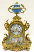 A late nineteenth century gilt-metal and painted Sevres porcelain mantel clock of Rococo form and