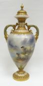 A Royal Worcester covered vase by Harry Davis, shape No.998 having elaborate twin-handles and a
