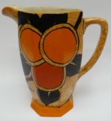 A Clarice Cliff 'Cafe-Au-Lait' faceted jug for the Bizarre range, 8ins high (20cms)