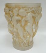A Lalique 'Bacchantes' tapered vase, moulded in relief with ten dancing nudes, etched to the base