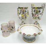 A pair of Spode chimney-vases, floral and bird encrusted with pink flowers and canaries (chipped