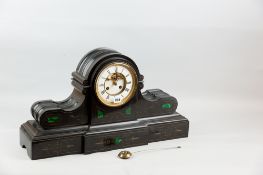 A Victorian black marble classical style mantel clock with malachite panels and chased gilt