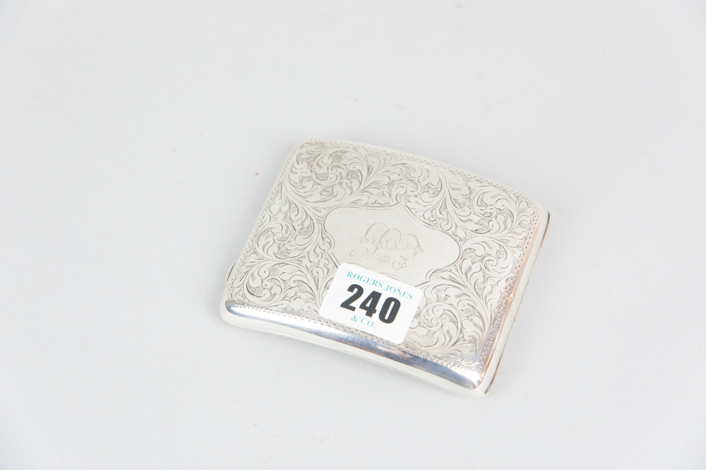 A gentleman's curved silver cigarette case, 3.9ozs, Birmingham 1921