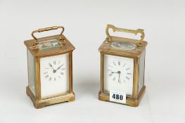 Two non-striking brass encased carriage clocks each with a white enamel dial and Roman numerals