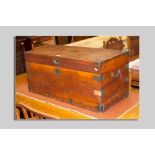 A camphorwood and metal banded chest with iron carrying handles, 39 x 83 cms