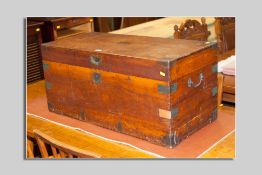 A camphorwood and metal banded chest with iron carrying handles, 39 x 83 cms