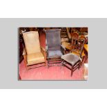 A 1930s oak reclining armchair with leatherette upholstery, an Edwardian American rocker with