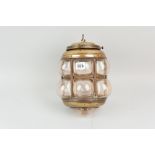 A blown glass lantern type shade in brass and metal frame with detachable bulb holder/ceiling