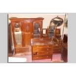 A nice quality late Victorian/early Edwardian four piece bedroom set of a double wardrobe with fixed