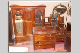 A nice quality late Victorian/early Edwardian four piece bedroom set of a double wardrobe with fixed