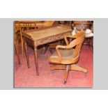 A late 19th Century mahogany desk type table having a narrow railback with two drawers and corner