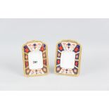 A pair of Royal Crown Derby Imari patterned easel portrait frames, numbered 1128 to the base, 19 cms