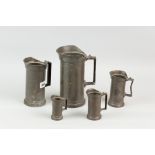 A set of five French cast pewter style measures of tankard form, marked 'Litre', 'Demi-Litre', '