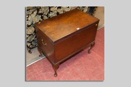 A late 18th/early 19th Century mahogany cellarette with brass end carrying handles on later cabriole