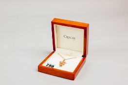 A 9ct gold fine link Clogau gold neck chain with Prince of Wales feather pendant mounted with a
