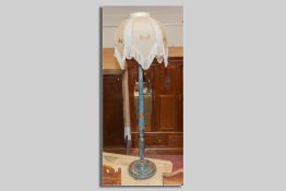 A blue chinoiserie decorated standard lamp and velum shade, 183 cms tall