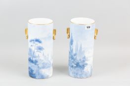 A good pair of Swedish Rorstrand lavender blue and white chimney vases, all over landscape