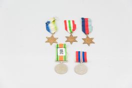 A parcel of WWll medals and ribbon - defence medals, The Italy Star, Atlantic Star and 39-45 Star,