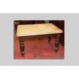 An early 19th Century scratch top kitchen table with single end drawer on bulbous turned and