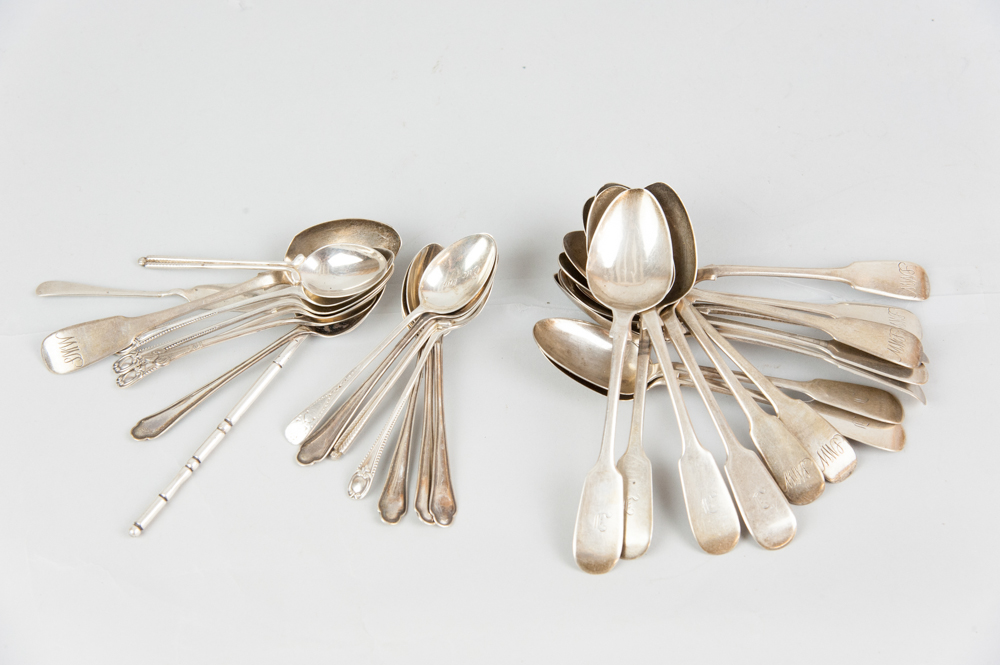 A large parcel of mixed silver tea and coffee spoons, total 14ozs