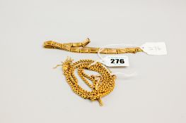 A fine 15ct gold link muff chain, approx 60 cms long with t-bar tassel and 9ct swivel etc, and a