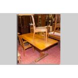 A set of four (three plus one diner) spindlebacked oak chairs with acorn motif by Alan Granger of