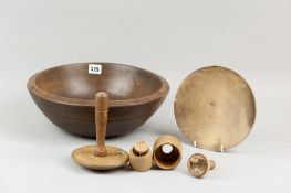 A group of treen items incl. an early nineteenth century sycamore dairy bowl with ring banding, 11