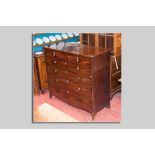 A 19th Century mahogany chest of four long graduated drawers and two small drawers, all with brass