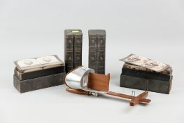 An Underwood & Underwood sunscope mahogany and aluminium stereoscopic viewer and two boxed