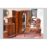 A good quality early 1900s mahogany bedroom suite with painted grain highlighting and multi-wood