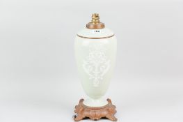 A large Celadon baluster shaper table lamp with Pate-Sur-Pate style decoration and angelic figure