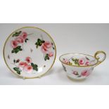 NANTGARW porcelain - tea cup and saucer, the cup with inverted heart shaped handle curving over