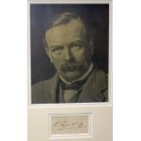DAVID LLOYD GEORGE autograph and photograph - sepia portrait framed jointly with a hand signature on