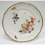 NANTGARW porcelain plate painted by THOMAS PARDOE - having alternating lobed rim, a moulded border