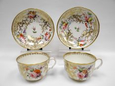 SWANSEA porcelain - pair of tea cups and saucers, the cups with ear shaped loop handles, with all