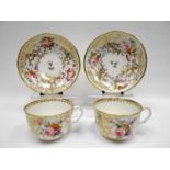 SWANSEA porcelain - pair of tea cups and saucers, the cups with ear shaped loop handles, with all