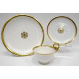 SWANSEA porcelain - cup, saucer and dish trio in the 'Paris Flute' design, undecorated but for