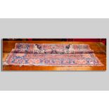 An antique Persian rug with geometric central design and wide floral border, 190 x 120 cms approx (