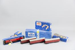 A Hornby Dublo three rail TPO (Travelling Post Office) boxed set with mailbags, three LMS maroon