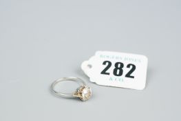 A platinum and diamond solitaire dress ring, the Edwardian cut diamond having a visual estimate of