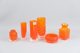 A group of Whitefriars glass tangerine coloured items - a bark effect vase, 19 cms high, a similar