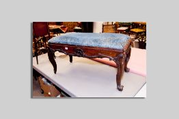 A Victorian mahogany duet stool having an upholstered top with egg moulded frieze (two parts